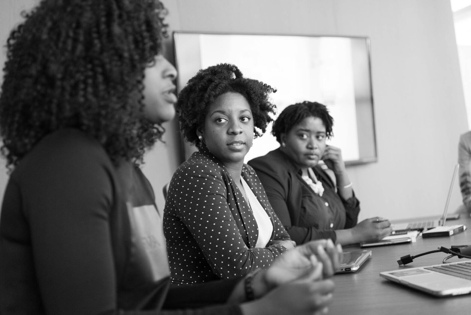 woman discussing with her colleagues