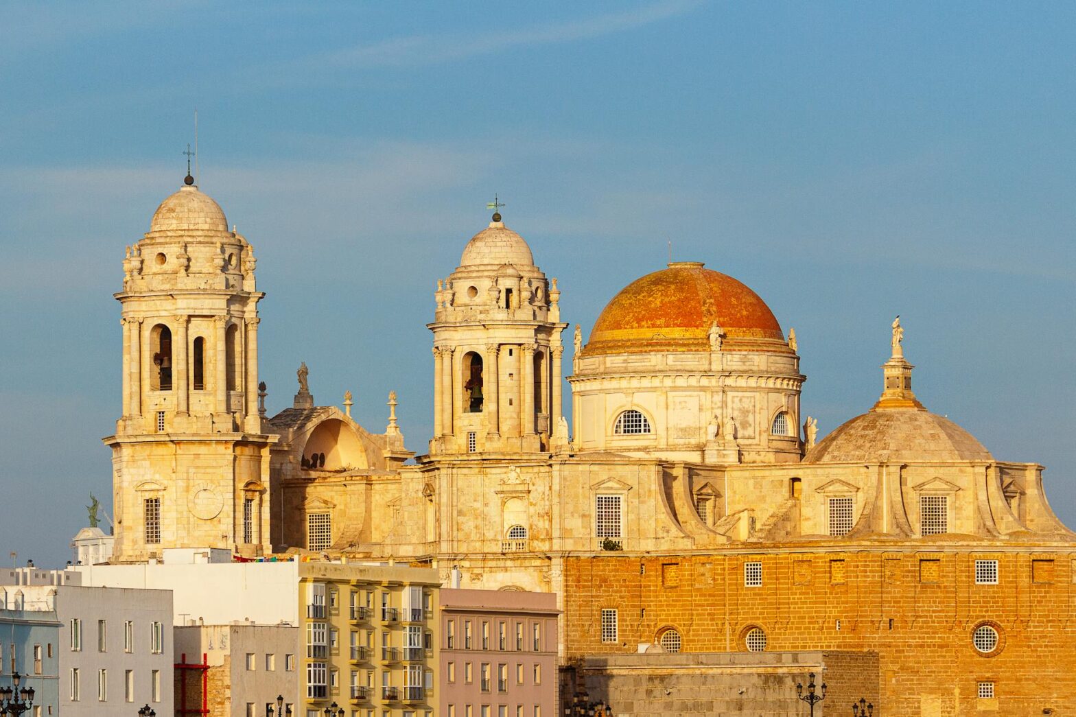 stunning view of cadiz cathedral at sunset