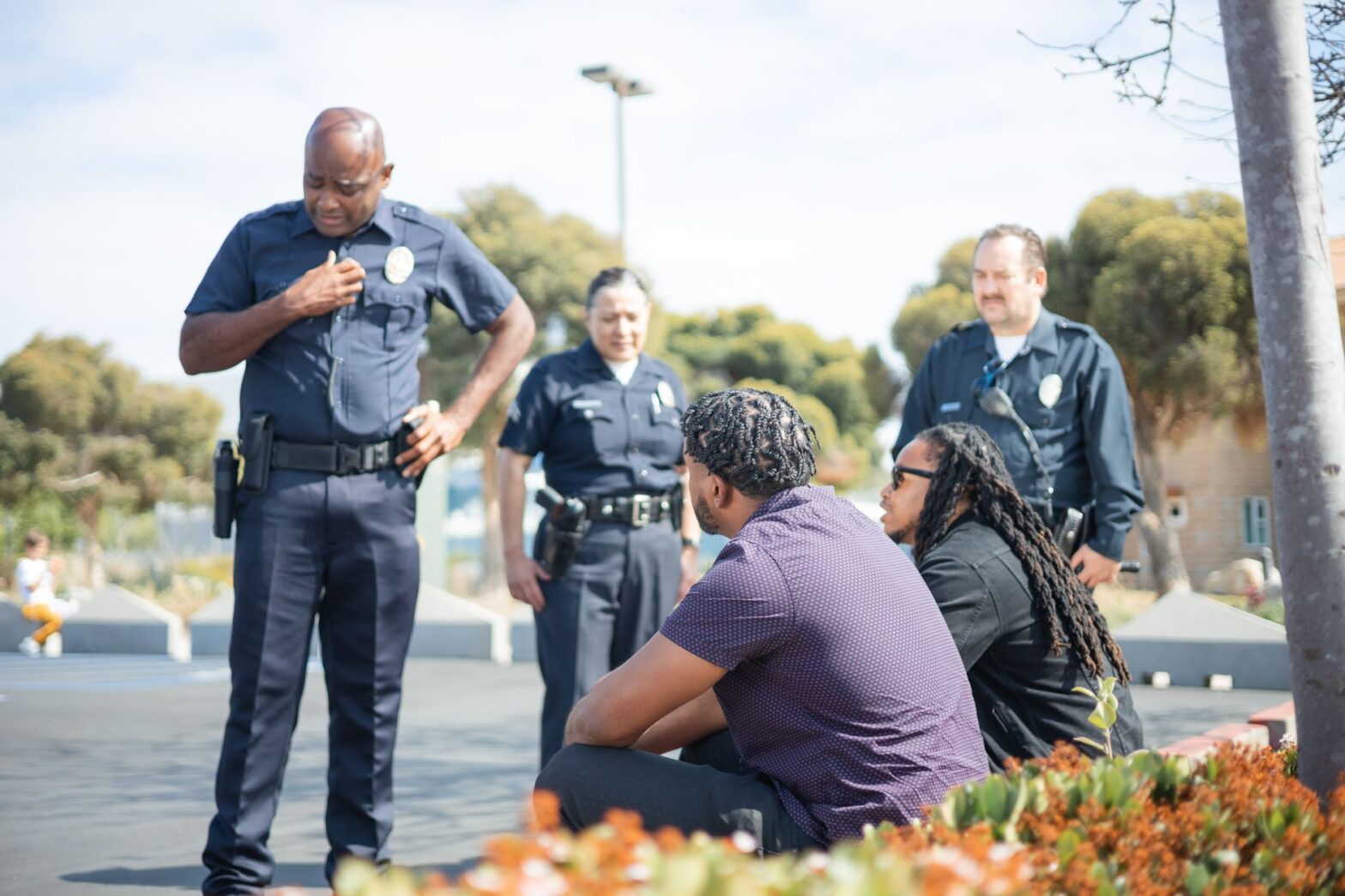 a policeman talking to the civilian
